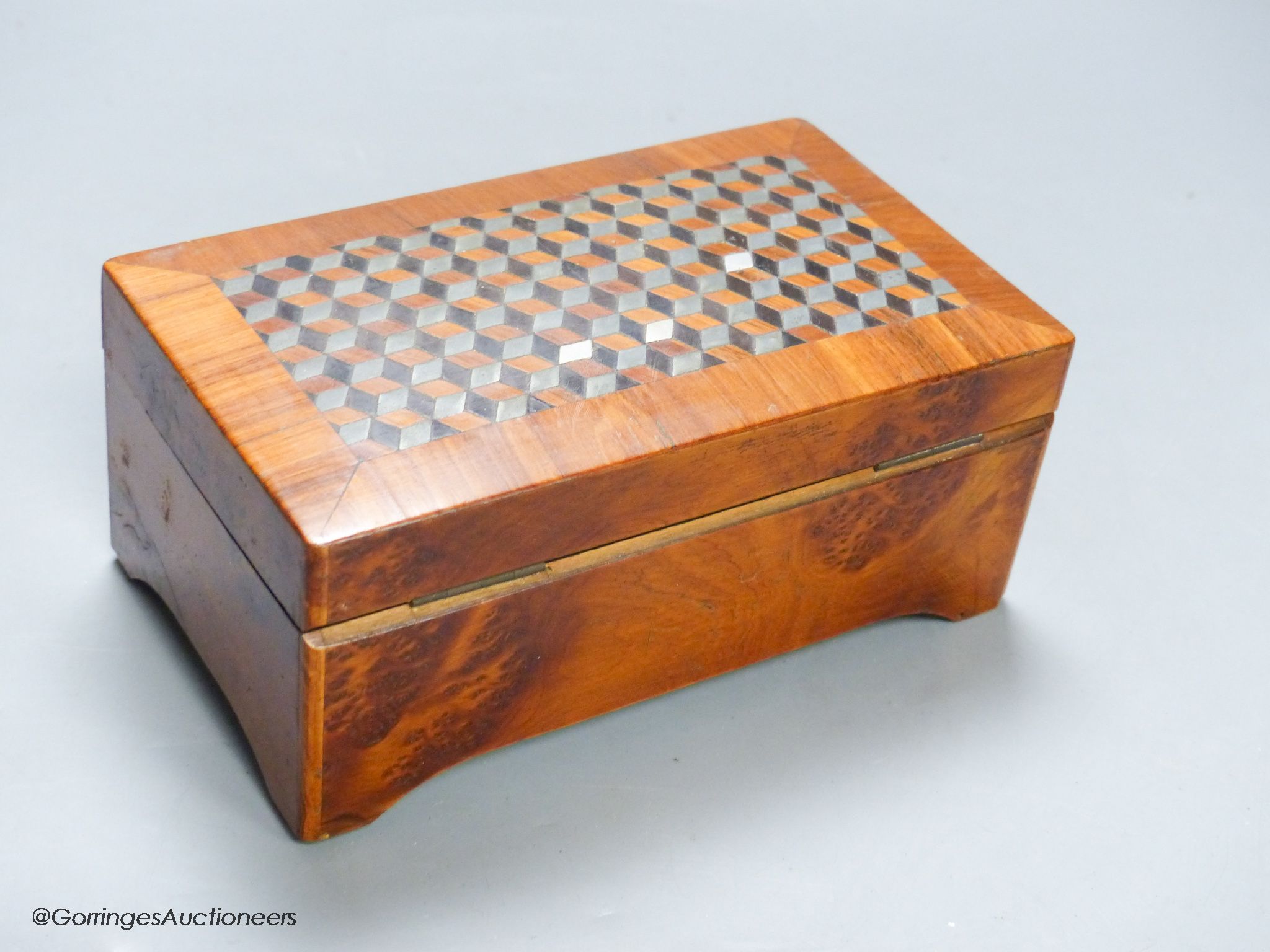A small Swiss amboyna six air cylinder musical box